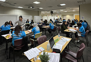 training room with classroom style with people and instructor